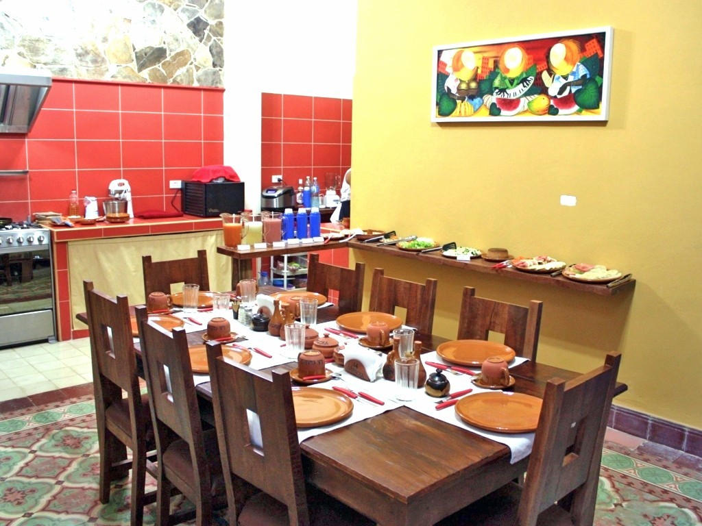 The breakfast table at La Gargola Guesthouse in Old Havana, Cuba