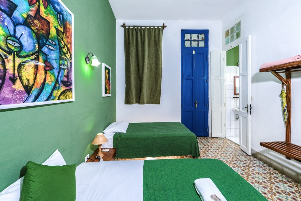 The Green room in La Gargola Hostal, Havana, Cuba