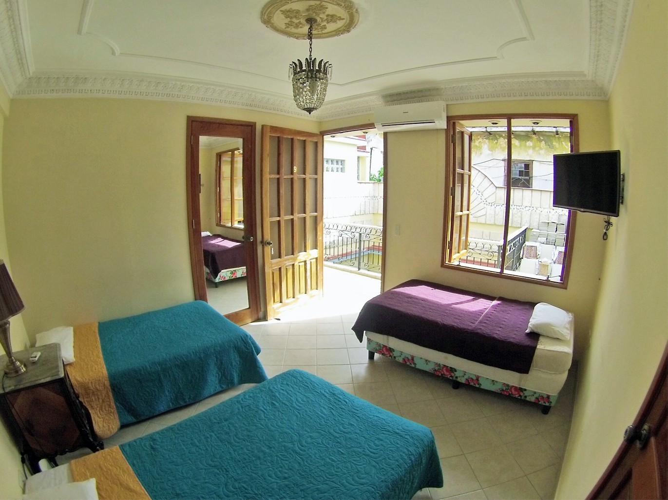 natural light streams into a guest room in Vedado, Havana