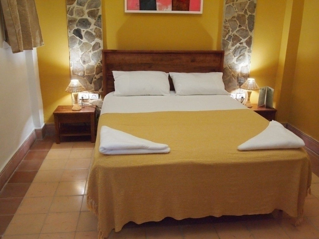 The Yellow Room in La Gargola guesthouse in Old Havana, Cuba